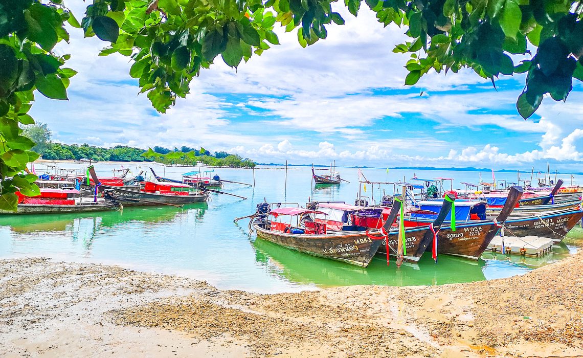 Krabi Boat - Railay Beach - Koh Lanta island real estate - koh lanta property why buy property in krabi Why Buy Property in Krabi? Koh Lanta island real estate Krabi Long Tail Boat 2025 01 1140x700